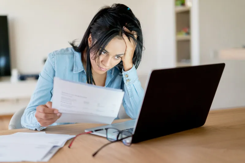 Business owner paying bills